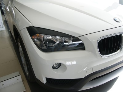 BMW X3 E83 Master Headlight Spoilers